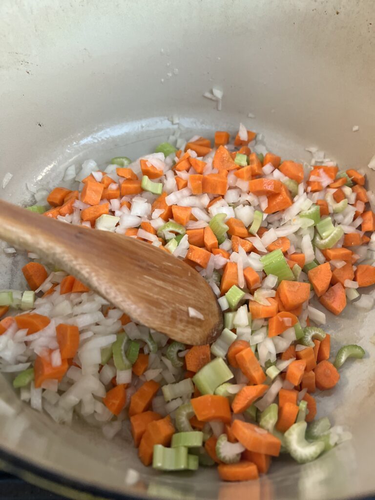 adding veggies to this easy one pot meal 